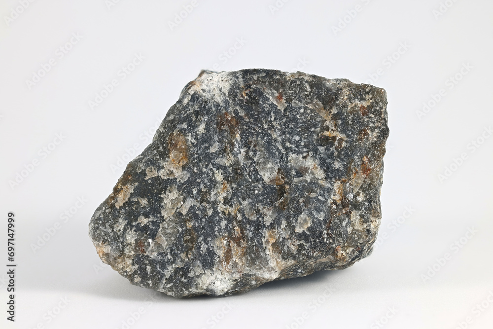 Cordierite, also called dichroite or iolite, is a silicate mineral that occurs as crystals or grains in igneous rocks Cordierite, also called dichroite or iolite, is a silicate mineral that occurs as crystals or grains in igneous rocks