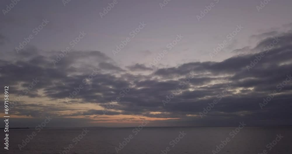 Bad weather over the river at sunset in the evening in autumn Bad weather over the river at sunset in the evening in autumn