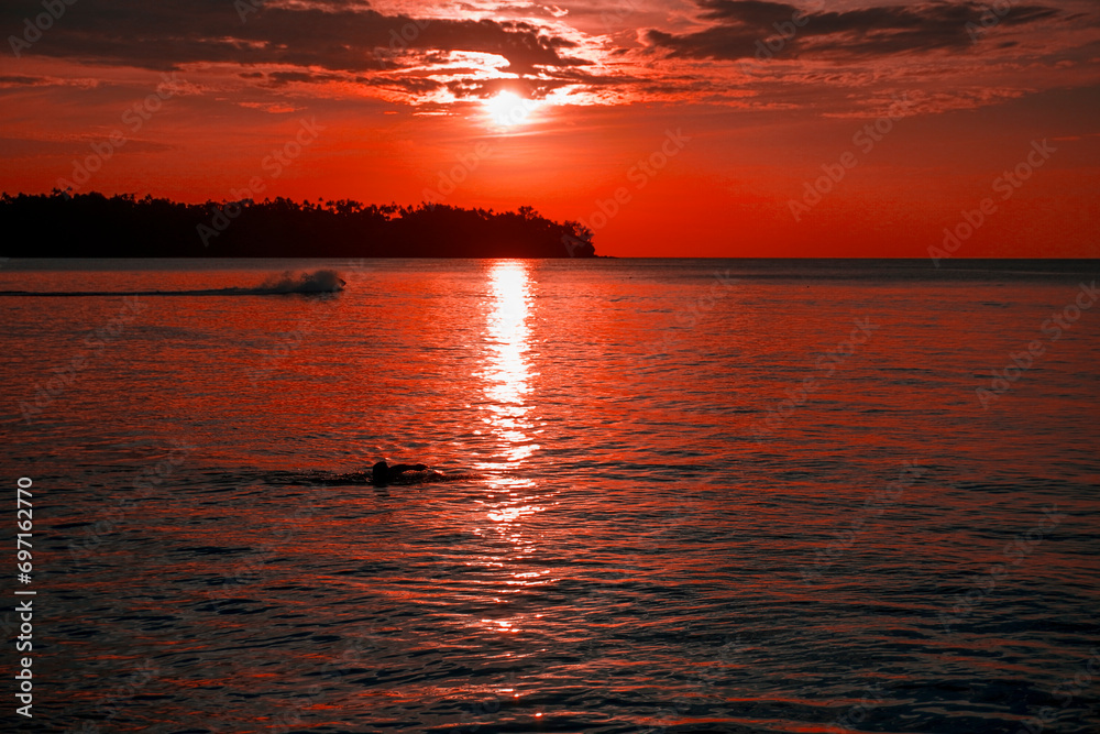 Naklejka premium Sunset at sea on Phuket island in Thailand