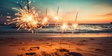 sparklers on the beach with a sunset view