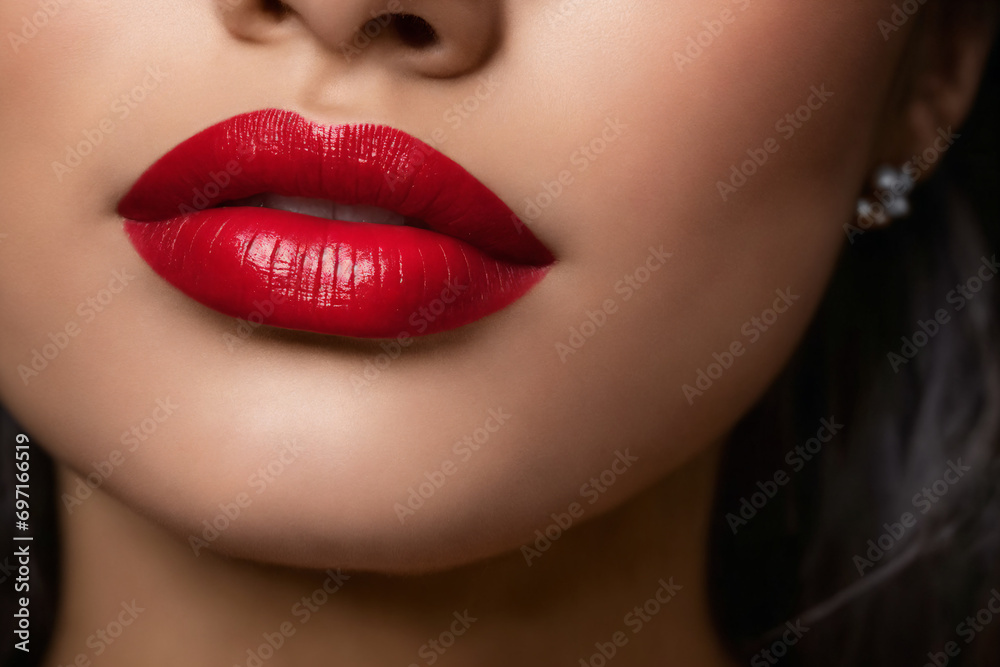 Close-up of beautiful lips with red lipstick Close-up of beautiful lips with red lipstick