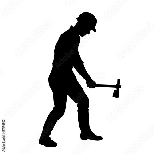 Silhouette of a worker in action pose using his axe tool.