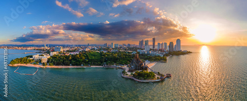Skyline of Pattaya city with The Sanctuary of Truth wooden temple in Pattaya Thailand