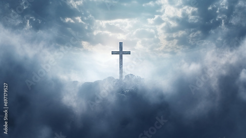 Cross in clouds symbol of the death and resurrection