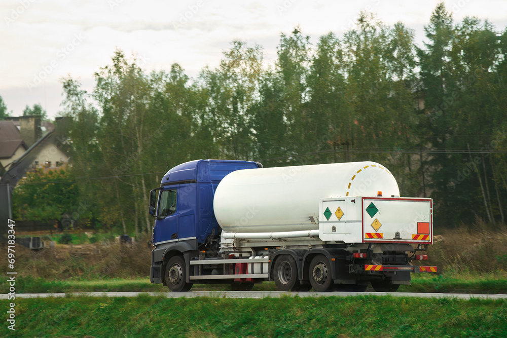 Dangerous goods transportation by semi truck with propane tank. The