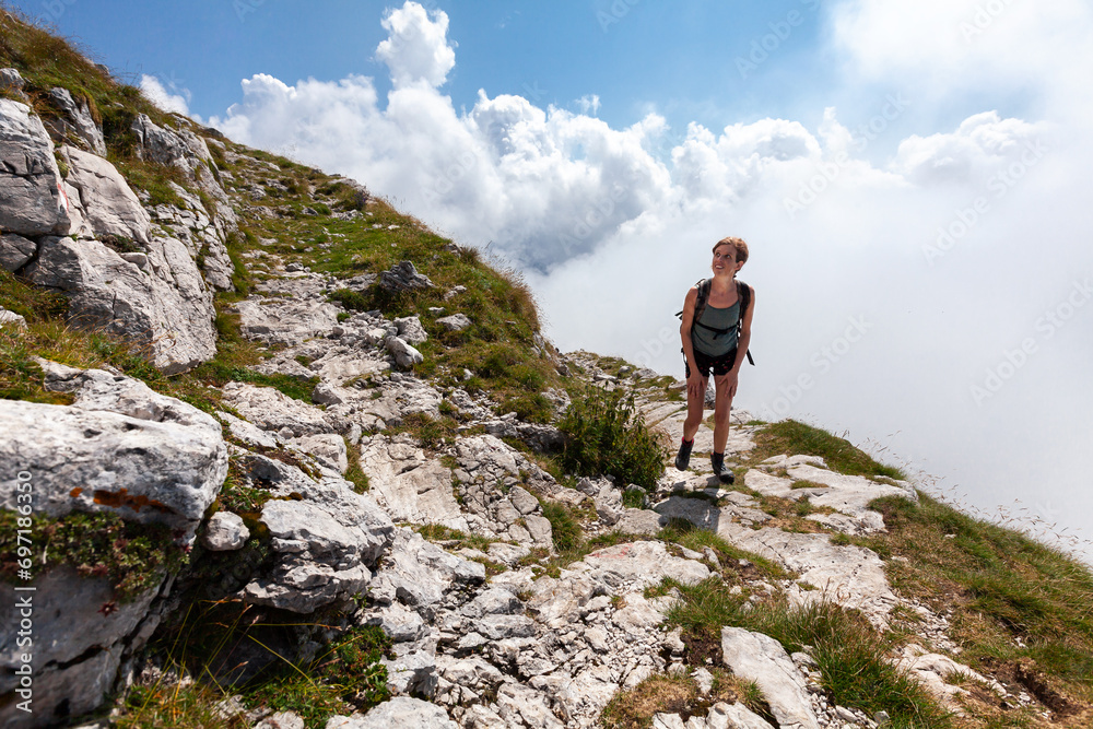 Beautiful Hike on Top Of Julian Alps Hiking Trail on Mount Krn for a Serene Adult Woman Hiker in Summer - Slovenia
