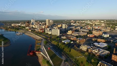 Memphis Cityscape in Tennessee.  Mississippi River Barge Hernando de Soto Bridge and Trafic in Background. Drone