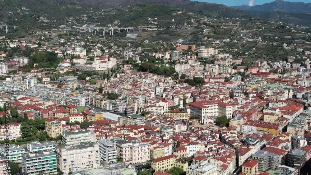 Aerial flyover above Sanremo Italy on the coast of the Mediterranean Sea on the Italian Riviera Aerial flyover above Sanremo Italy on the coast of the Mediterranean Sea on the Italian Riviera