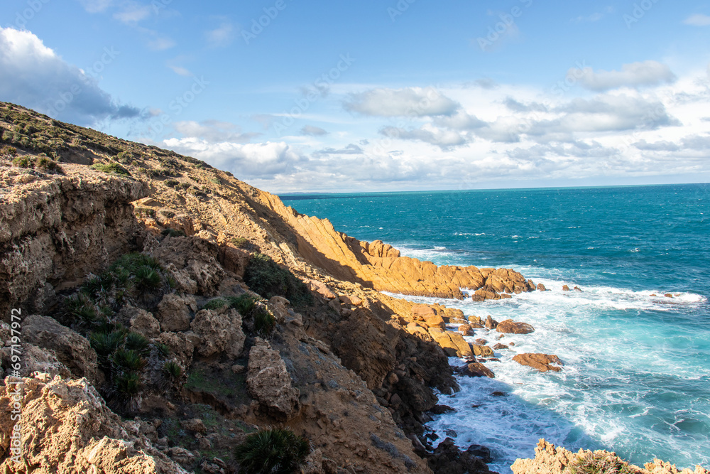 Port aux Princes, Tunisia, Cliffs and Rocks, Mediterranean Sea landscape with beautiful blue sky. Heavenly Escape. Takelsa