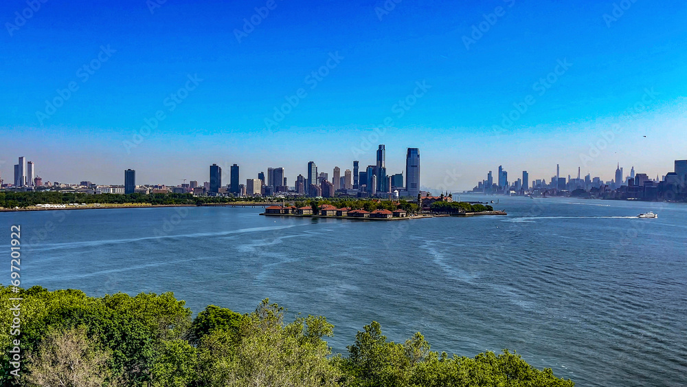 Ellis Island and the skyline of New York (USA), seen from Liberty Island, where the Statue of Liberty is located, a place known all over the world.