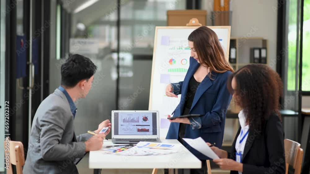 Business team discuss at meeting room. working together with laptop ,tablet and smart phone on desk Financial accountant Business team discuss at meeting room. working together with laptop ,tablet and smart phone on desk Financial accountant
