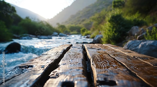 Empty wooden planks, blurred river background.