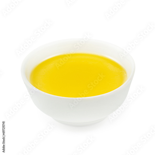 Yellow sauce, on a wooden board, on a white background