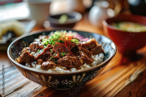Japanese Culinary Delight: Gyudon, a Delicious Rice Bowl Highlighting Thinly Sliced Beef, Slowly Simmered in a Savory Fusion of Soy Sauce, Mirin, and Dashi, Creating an Irresistible Tapestry of Flavor