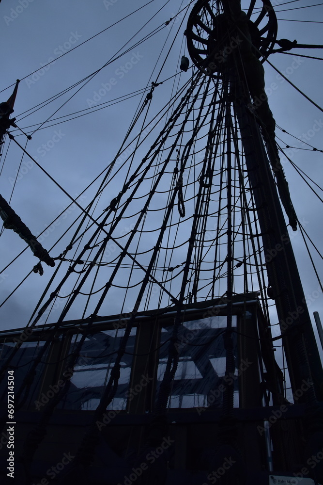 Fototapeta premium vintage ship with a mast on the pier