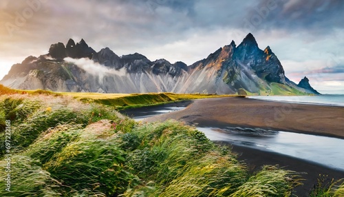 majestic summer scene of stokksnes headland with vestrahorn batman mountain on background unbelievable evening view of iceland europe beauty of nature concept background photo