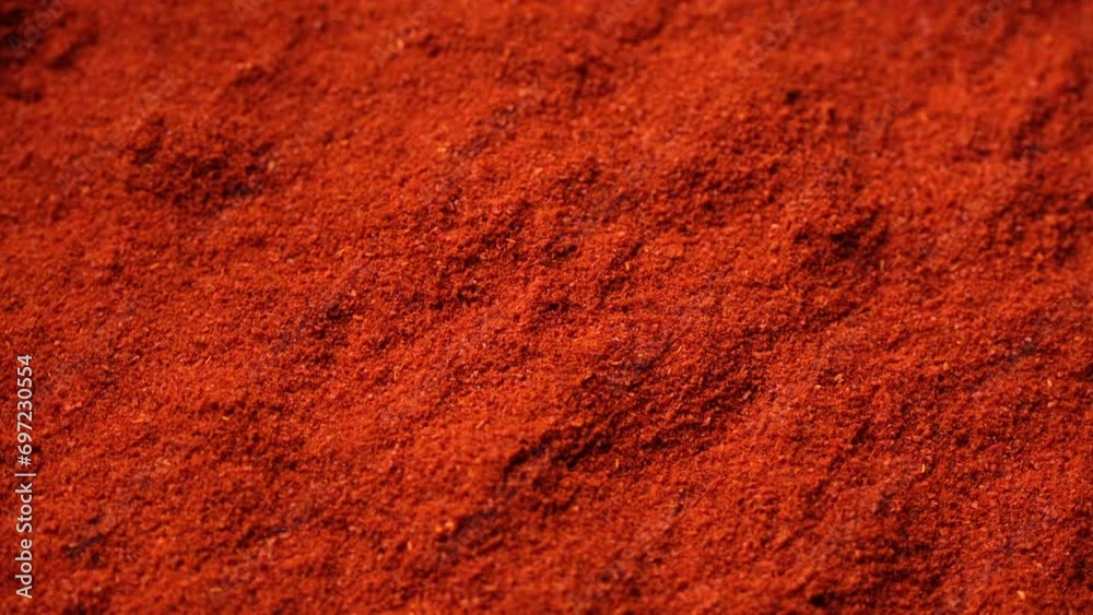 Zoom frame red smoked paprika powder or chili pepper, close up