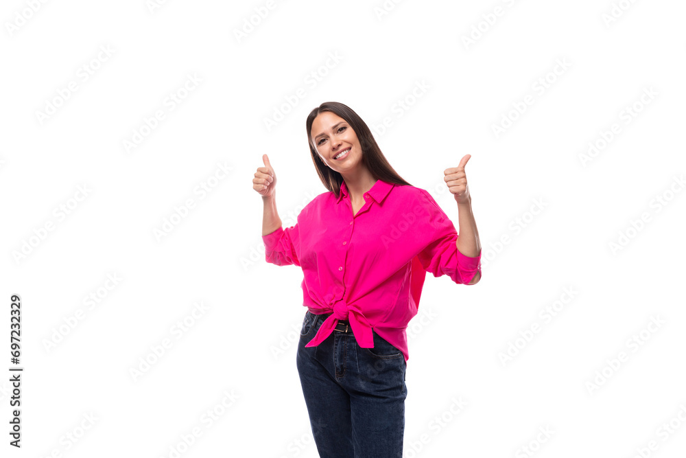 young fashionista caucasian brunette woman dressed in a crimson shirt on a white background young fashionista caucasian brunette woman dressed in a crimson shirt on a white background