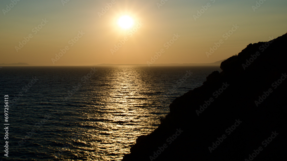Seascape at sunset. Sunset where the Aegean and the Mediterranean meet.