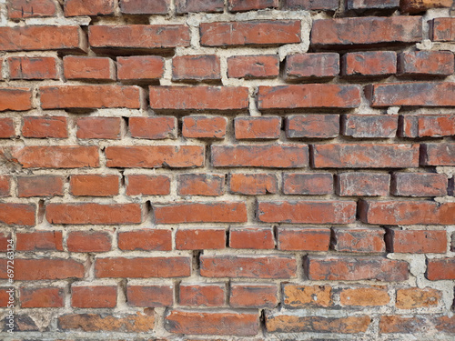 old fortress wall of stones. Background of medieval brickwork for design.