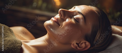Couple enjoys peaceful spa ambiance while rejuvenating with facial skincare treatment. photo