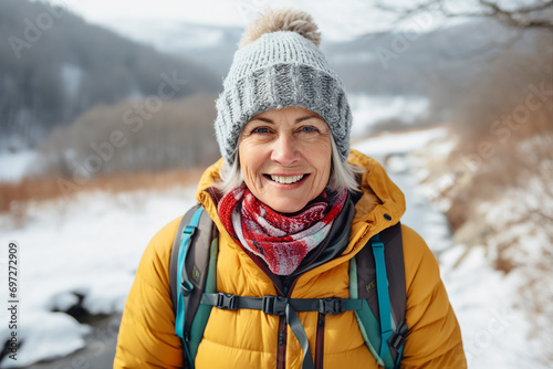 Portrait of professional climber with backpack standing on high snowy mountains on winter day generative AI