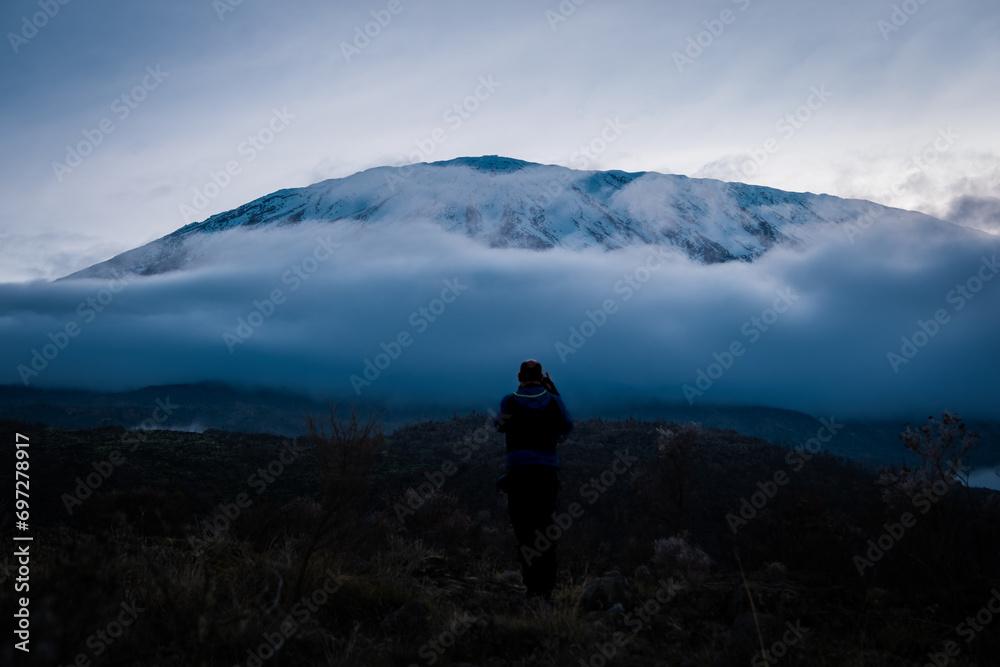 Man capturing Kilimanjaro at dawn