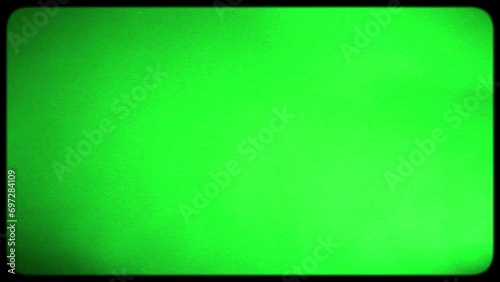 Green screen, kinescope effect and VHS elements. Implementing chromakey techniques to create the vintage effect reminiscent of an old TV with kinescope, evoking a retro ambiance. photo