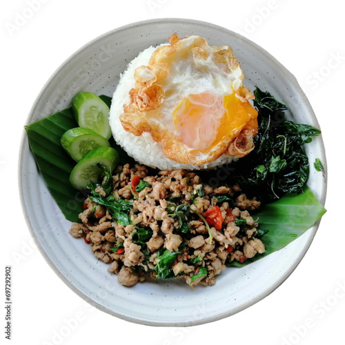 Thai food, pork basil rice and fried egg, white background.