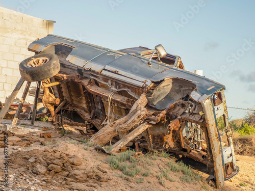 Abandoned car in adolfo lopez mateos remote village of baja california sur, Mexico photo