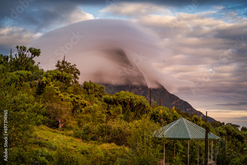 Mist over Mikeno volcano from camp on Karisimbi volcano, Rwanda photo