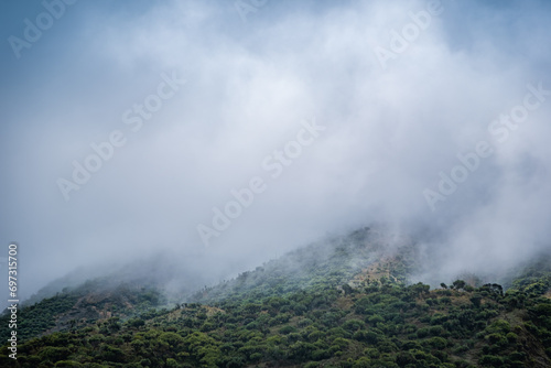 Mist lifting from the slopes of Karisimbi volcano, Rwanda photo