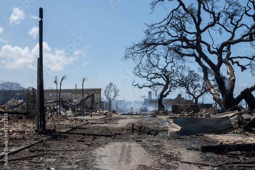 Lahaina, Maui, Hawaii, USA August 9, 2023.   An unidentified man stands in the middle of Front Street the morning after the devastating fires that destroyed Lahaina Town on Maui.  