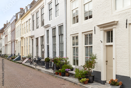 Street with the facades of historic houses in the center of the city of Middelburg in Zeeland.