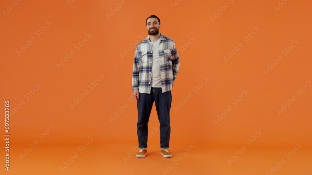 Young bearded man opens leather wallet and rejoices finding money cash Young bearded man opens leather wallet and rejoices finding money cash