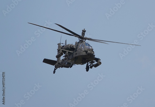 ah-64 apache helicopter in flight	