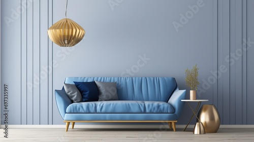 In this living room, there is a blue sofa and a lamp with gold leaf on it. photo