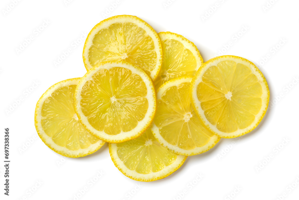 Heap of fresh raw juicy lemon slices close up isolated on white background