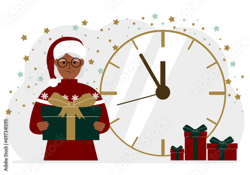 A woman in a red sweater and a red cap with a large gift box. 5 minutes before Christmas or New Year.