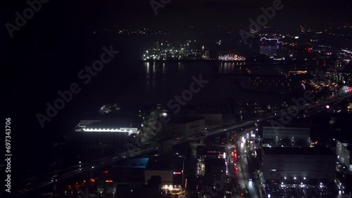Osaka Kansai international airport bay area at night timelapse aerial view ocean buildings lighting photo