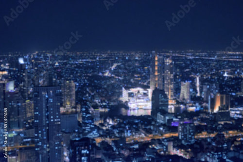 Blurred image bokeh of Bangkok cityscape  night top view in the business district in Thailand.