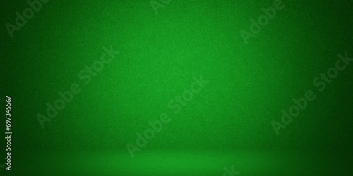 photo background green. textured wall rolling in the floor. studio photography background illuminated by the directed light Traditional painted canvas or muslin fabric cloth studio backdrop photo