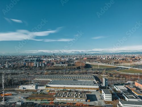 Top view from a drone of the final station of the San Donato M3 metro and Bus station. Italy, San Donato Milanese. ATM - Azienda Trasporti Milanesi. 