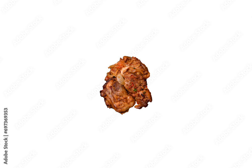Delicious fried chicken in sauce with onions, salt, spices and herbs Delicious fried chicken in sauce with onions, salt, spices and herbs