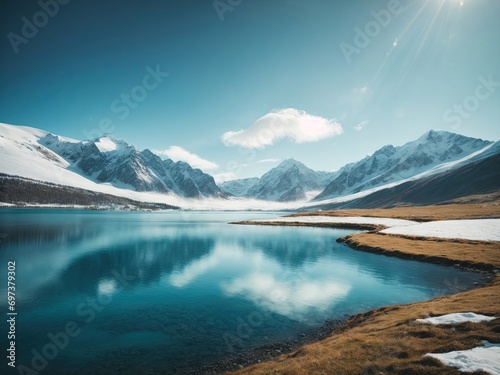 Fantastic winter landscape with snow-capped mountains and blue lake, lake and mountains, landscape with lake, A stunning winter landscape featuring snow-capped mountains and a serene blue lake © Younes
