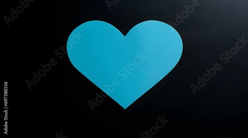 Sky Blue Paper Heart on a black Background. Romantic Template with Copy Space