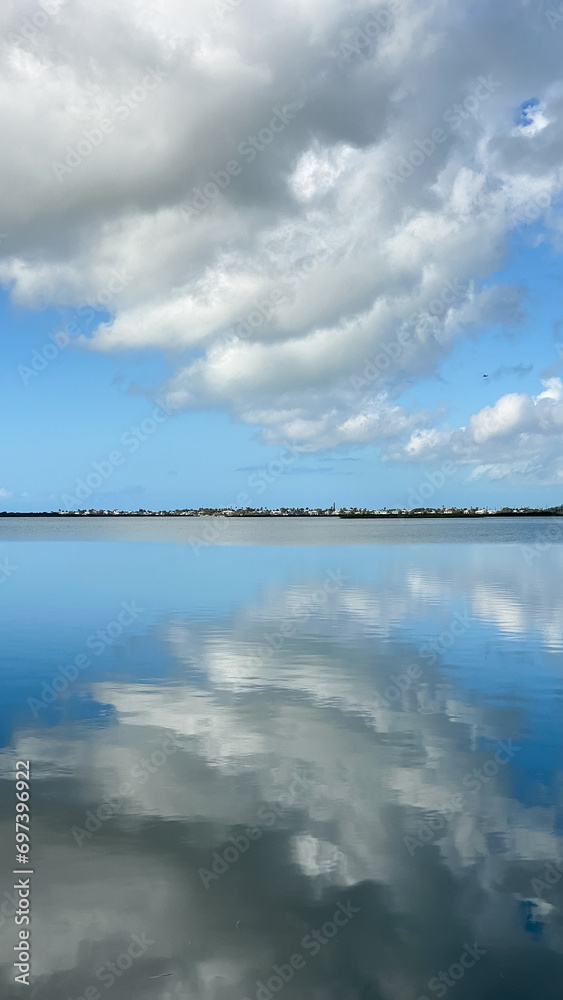Blue Sky and Cloud Reflections in Water in Florida Keys