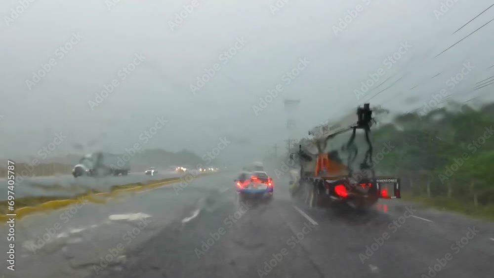 Driving in heavy rain on floated street road highway Mexico. Driving in heavy rain on floated street road highway Mexico.