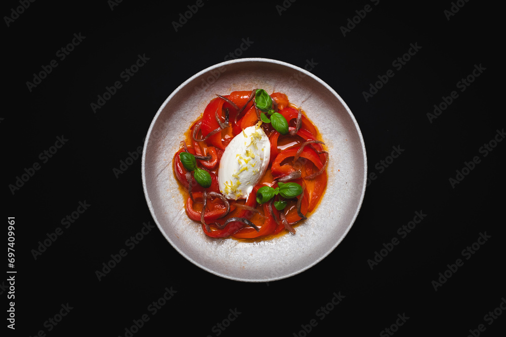Food photography on a black background. Exquisite food, restaurant service. Food photography on a black background. Exquisite food, restaurant service.