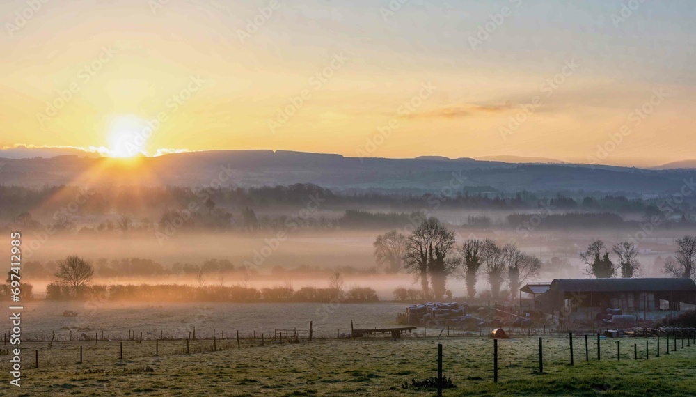 Beautiful Foggy Sunrise at Farm in Ireland Beautiful Foggy Sunrise at Farm in Ireland